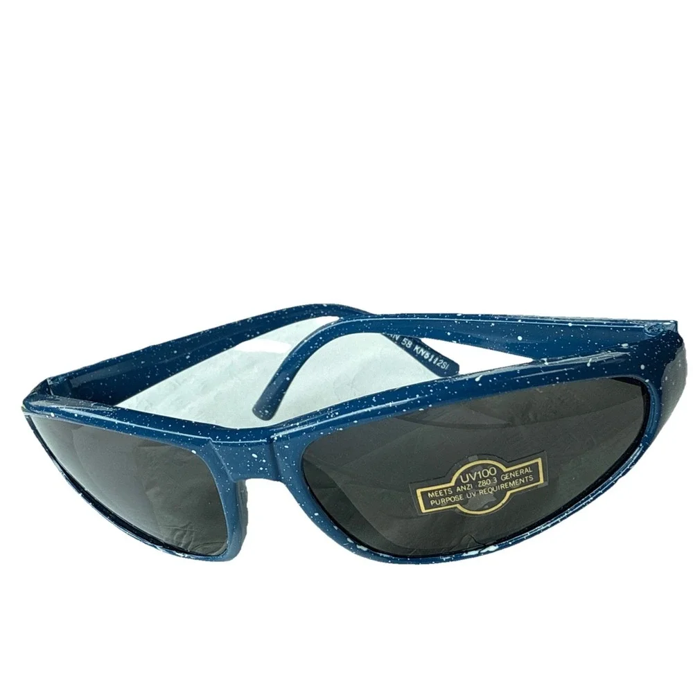 Stiegl sunglasses Light Blue‎ frames with sparkles.